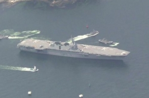 Japan sends biggest warship to protect US supply vessel