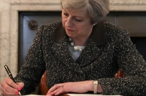 UK PM signs letter that will trigger Brexit