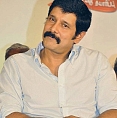 Chiyaan Vikram goes to Puli's producer