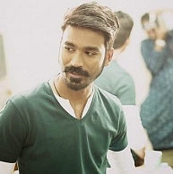 What is Dhanush going to race with, in Maari? ...