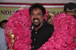 Anil Mehta and South Indian cinematographers honoring Santosh Sivan