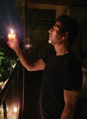 Celebrities photos with Diya and Torchlights to stand united against Corona