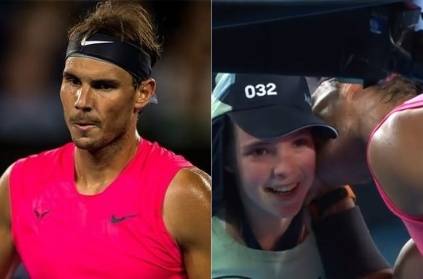 rafael nadal hits ball girl kisses on cheek crowd amused