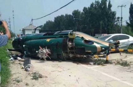 helicopter injuring crashes down