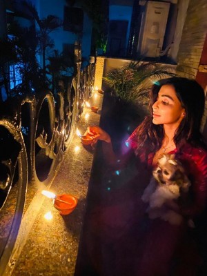 Celebrities photos with Diya and Torchlights to stand united against Corona